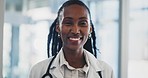 Face, smile and a doctor black woman in the hospital for positive diagnosis or treatment you can trust. Portrait, healthcare and medical with a happy young medicine professional in a health clinic