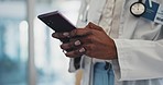 Closeup, hands and doctor with a smartphone, typing and social media with a contact, email and connection. Person, medical professional and employee with a cellphone, search internet and healthcare