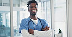 Happy black man, doctor and arms crossed of healthcare professional in confidence at the hospital. Portrait of African male person or confident medical expert smile in health advice, help or care