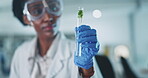 Test tube, plant and science, black woman and scientist in lab, medical research and ecology with sample. Environment study, liquid solution and analysis with leaves, green and scientific experiment