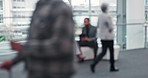 Bokeh, walking and business people at an airport for travel, holiday or working. Blur, busy lobby and group of corporate  employees talking with luggage and suitcase for a vacation or flight together