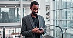 Business, smile and black man with a smartphone, typing and network with connection, communication and contact. African person, employee and professional with mobile app, cellphone or search internet