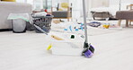 Cleaning, supplies and a broom for sweeping on the floor of an apartment ready for housekeeping chores. Home, dust and hygiene with equipment in a room to remove bacteria or tidy during housework