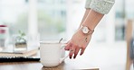 Cleaning, dishes and hands with cup in living room for hygiene, housework and maintenance in home. Housekeeping, closeup and person picking mugs on coffee table for tidy home, surface and furniture