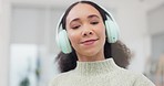 Cleaning, music and woman with spray on glass for dust, bacteria and dirt on window with headphones. Maid, housekeeping and person listening to song, radio and audio for housework with disinfectant