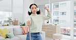 Singing, music and woman dance with headphones, broom and playlist while cleaning house on the weekend. Radio, karaoke and female sing to podcast, song or audio track with earphones for spring clean