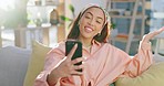 Video call, phone and woman at home with smile, conversation and talking on sofa. Online, mobile web app and discussion on a couch communication with a happy female person with a smile and chat