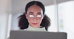 Business woman, computer and research, reading or planning for article, editing or news review in office. Professional writer, editor or journalist in glasses and laptop pc for company online report