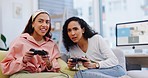 Lgbt women on sofa playing video games, competition and relax in living room of home with internet, controller and streaming. Online gaming, esports and happy lesbian couple on couch with virtual fun