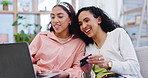 Laptop, credit card and funny friends, women and online shopping, banking or payment on home living room sofa. Computer, ecommerce and plastic money of girls laughing, happy and fintech conversation