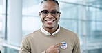 Face, vote and a black man pointing to a badge in support of freedom, democracy or choice in politics. Portrait, smile and proud of his choice, decision or selection of political party in an election