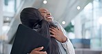 Travel, business woman and friends hugging in the airport to welcome after an international flight. Face, smile and greeting with corporate people embracing in a hotel lobby or terminal for a trip