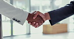 Business people, handshake and meeting in partnership, thank you or deal together at the office. Closeup of employees shaking hands in support, teamwork or agreement and welcome at the workplace