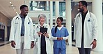 Healthcare, education and a team of doctors walking in a hospital in discussion of consulting or treatment. Medical, leadership  and a professional group of medicine personnel in a clinic for health