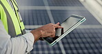 Man, technician and hands on tablet in solar panel installation, electrical maintenance or inspection on rooftop. Closeup of person, engineer or contractor working on technology in alternative energy