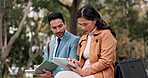 Business people, discussion and tablet for notes or feedback on ideas, research and planning for proposal or meeting. Outdoor, employees and teamwork or collaboration in park with communication
