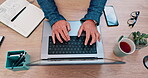Business person, hands and laptop for planning, website design and marketing research at office desk above. Worker or graphic designer typing on computer keyboard for social media branding and goals