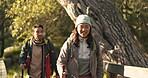 Adventure, hiking and happy with couple in forest for relax, fitness and peace. Love, calm and health with man and woman walking in nature for travel vacation, trekking and camping holiday together