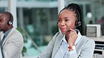 Call center, customer support and female consultant in the office doing online consultation. Crm, communication and young African woman telemarketing or sales agent working with headset in workplace.