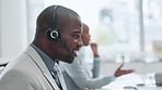 Call center, customer support and male consultant in the office doing an online consultation. Contact us, crm and young African man telemarketing or sales agent working with headset in the workplace.