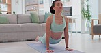 Exercise, yoga and woman stretching, meditation and workout for wellness, health and fitness in a living room. Person, home or athlete in a lounge, zen or peace with self care, stretch or flexibility