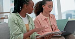 Lgbt couple, laptop and paper at home for budget, finance planning and bills on a sofa. People together on a couch with technology and documents for remote work, savings and asset management