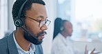 Face, customer service and a black man consultant working in a call center for support or assistance. Contact us, crm and headset communication with an employee consulting in a telemarketing office