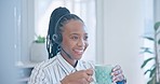 Happy black woman, call center and drinking coffee in customer service, support or telemarketing at office. African female person, consultant or agent enjoying hot beverage in contact us at workplace