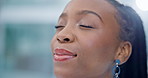 Black woman, face and breathing in relax, stress management or self control in business office. Closeup of calm or happy African female person smile in happiness, relief or satisfaction at workplace