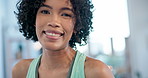 Smile, portrait and face of young woman with clean skin, happiness and positive attitude. Headshot of happy, natural and African person with curly hair and confidence in health, fitness and wellness