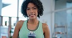 Fitness, face and happy woman in living room with water bottle for yoga, workout or holistic exercise at home. Smile, portrait and female athlete relax after training, pilates or meditation routine