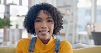 Face of woman on sofa in home, relax and smile in living room in Brazil with pride, peace and weekend. Portrait, blurred background and happy gen z girl on couch in apartment lounge with confidence.