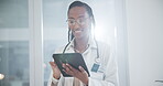 Doctor, tablet and happy healthcare, hospital or clinic services, software management and online charts. medical worker, nurse or african person scroll on digital technology for Telehealth report