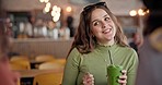 Girl friends, talk and smoothie in cafe, green drink and happy for health, nutrition and juice with smile. Gen z woman, milkshake or diet with group, students and chat in restaurant, diner and cafe