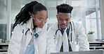 Doctors, computer talk and black people in a hospital or medical clinic with web research and planning. Teamwork, collaboration and pharma consulting with healthcare and working in a work discussion