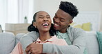 Couple, black people and laughing for conversation in home with love, care and chat together in happy relationship. Man, woman and hug for funny joke, freedom and relax to talk with partner on sofa 