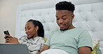 Smile, night and a black couple with a laptop in a bed for communication, email or remote work. Happy, house and an African entrepreneur typing on a computer with a woman and a phone for social media