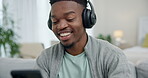 Happy black man, smartphone and dance with headphones on sofa for streaming sound, radio app and audio subscription. Cellphone, dancing and freedom of listening to music, podcast and media in lounge 