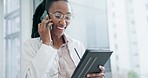 Doctor, woman and phone call with tablet in hospital for advice, telehealth services or help. Happy african medical surgeon talk hello on smartphone with digital tech, consulting info or test results