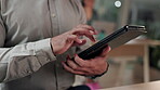 Businessman, hands and tablet in research, social media or online networking at the office. Closeup of man or employee working on technology in communication, search or browsing by desk at workplace