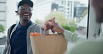 Delivery, grocery and bag with a black man courier at the front door of a home to drop off produce for a customer. Food, ecommerce and online shopping with a male at a house to deliver fresh goods