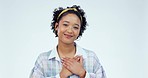 Woman, face and thank you with hand on chest in studio for grateful, gesture or sign against white background. Portrait, smile and female model with emoji on heart for gratitude, peace and self love