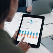 Hands, tablet and chart for analysis, financial review and planning ...