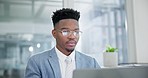 Laptop, research and businessman in the office while working on a corporate legal project. Serious, busy and young professional African attorney planning for a law case with a computer in workplace.