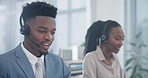 Black man, callcenter and phone call, CRM and contact us with communication and coworking space with team. Customer service consultant, help desk and advice with tech support and headset with mic