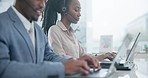 Business people, call center and laptop in customer service, support or telemarketing team at office. Black man and woman consultant or agent working together on computer in contact us or online help