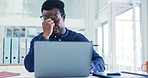 Business man, headache and frustrated on laptop for stock market crash, bankruptcy and online mistake or error. Worker, african person or trader with pain, sad or stress for trading fail on computer