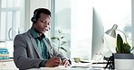 Call center, writing and black man consultant in the office with an online consultation. Contact us, crm and African male customer support or telemarketing agent working on computer in the workplace.