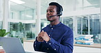 Laptop, call center and black man talking, telemarketing and contact us for support in office. African professional, customer service and sales agent in communication, consulting and crm at help desk