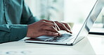 Business, hands and a person typing on a laptop for communication, email or contact. Desk, workspace and a corporate employee on a computer in an office for internet, working or online search